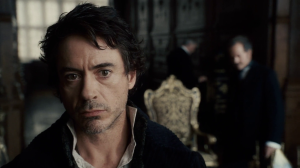 Downey Jr. as a disheveled as Holmes. 